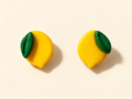 Puces d’oreilles citron en pâte polymère jaune et verte faites main