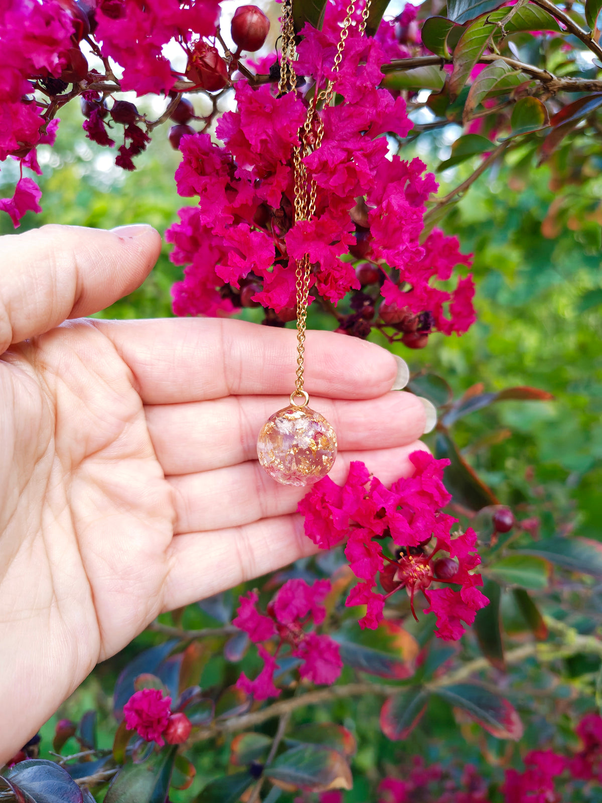 Collier boule rose doré